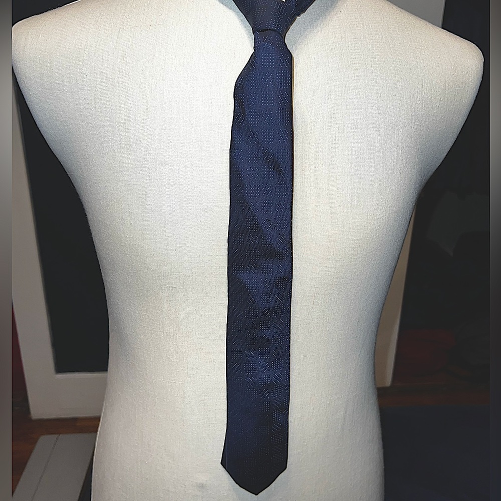 Navy square polka dot tie.